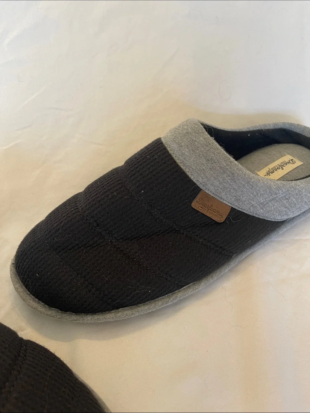 Men's Black Slip-On Quilted House Shoes with Grey Trim dearfoams